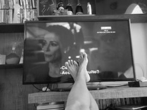 watching television